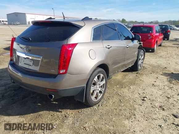 2012 Cadillac SRX Performance Collection with VIN 3GYFNBE3XCS565616, listed as a IAAI auction lot 41835476 with 141,259 mi miles. Bid and sale history available at carsss.com. Image 4.