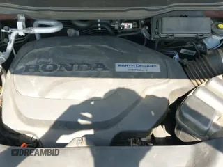 2020 Honda Pilot Elite z VIN 5FNYF6H08LB050871, wystawiony jako IAAI lot #42704675 z przebiegiem 77 095 mil mil oraz . Historia ofert i sprzedaży dostępna na DreamBid. Obrazek 20.