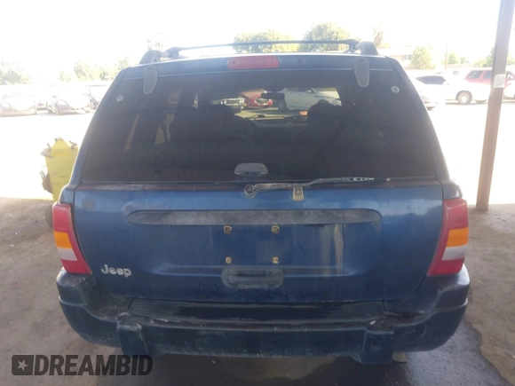 2000 Jeep Grand Cherokee Laredo with VIN 1J4G248SXYC274865, listed as a IAAI auction lot 42542922 with 185,902 mi miles and . Bid and sale history available at DreamBid. Image 16.