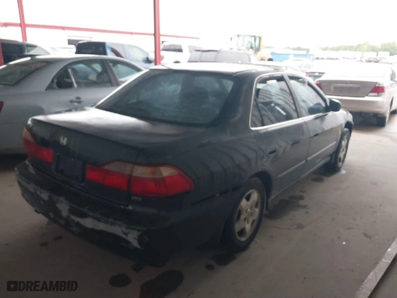 1999 Honda Accord Sdn EX with VIN 1HGCG165XXA046541, listed as a IAAI auction lot 41823805 with 266131 miles. Bid and sale history available at carsss.com. Image 4.
