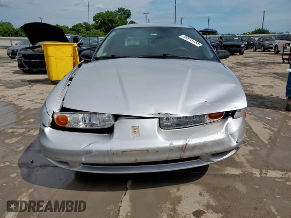 2002 Saturn SL с VIN 1G8ZH52892Z242469, выставлен на аукционе Copart как лот 59973755 с пробегом Не указан миль и Списание • Salvage title. История ставок и продаж доступна на DreamBid. Изображение 5.