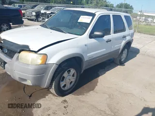 2002 Ford Escape XLT Choice with VIN 1FMYU03132KD02414, listed as a IAAI auction lot 42121509 with 218,148 mi miles and . Bid and sale history available at DreamBid. Image 2.