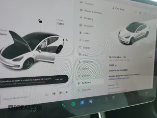 2019 Tesla Model 3 Mid Range z VIN 5YJ3E1EA2KF486532, wystawiony jako Copart lot #58082635 z przebiegiem 51 920 mil mil oraz Tytuł czysty. Historia ofert i sprzedaży dostępna na DreamBid. Obrazek 9.