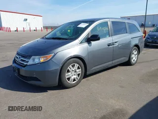 2012 Honda Odyssey LX with VIN 5FNRL5H24CB145694, listed as a IAAI auction lot 41902821 with 134,402 mi miles and . Bid and sale history available at carsss.com. Image 17.