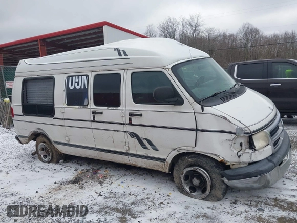 1999 Dodge Cargo Conversion with VIN 2B6HB11Y8XK563608, listed as a IAAI auction lot 41726411 with 199,239 mi miles and . Bid and sale history available at DreamBid. Image 13.