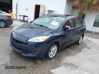 2014 Mazda 5 Sport with VIN JM1CW2BL6E0169672, listed as a IAAI auction lot 42422459 with 212,179 mi miles and . Bid and sale history available at DreamBid. Image 2.