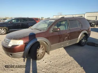2009 Ford Taurus X SEL with VIN 1FMDK05W39GA03595, listed as a Copart auction lot 76872774 with 303,611 mi miles and Salvage Title. Bid and sale history available at DreamBid. Image 1.