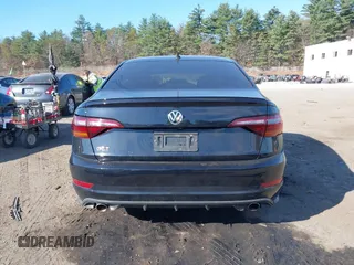2019 Volkswagen Jetta GLI S z VIN 3VW5T7BU1KM156888, wystawiony jako IAAI lot #40778065 z przebiegiem 97 114 mil mil oraz . Historia ofert i sprzedaży dostępna na DreamBid. Obrazek 16.