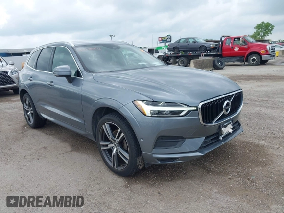 2018 Volvo XC60 Momentum z VIN LYV102RK1JB079168, wystawiony jako IAAI lot #42115403 z przebiegiem 58 377 mil mil oraz . Historia ofert i sprzedaży dostępna na DreamBid. Obrazek 1.