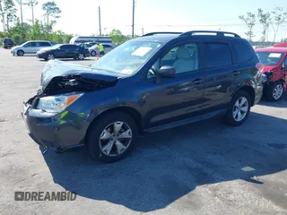2015 Subaru Forester 2.5i with VIN JF2SJABC6FH823742, listed as a IAAI auction lot 42069857 with 74,966 mi miles. Bid and sale history available at carsss.com. Image 2.