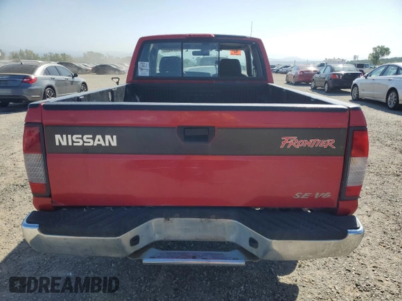 1999 Nissan Frontier XE with VIN 1N6ED26Y1XC302907, listed as a Copart auction lot 51323035 with 218,325 mi miles and Clean title. Bid and sale history available at DreamBid. Image 6.
