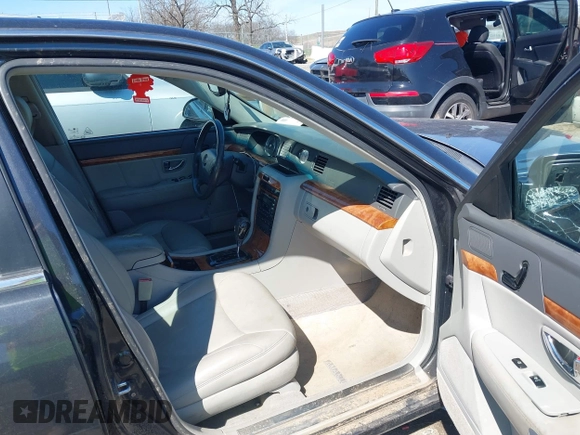 2006 Kia Amanti with VIN KNALD124965086201, listed as a IAAI auction lot 41843560 with 169,055 mi miles. Bid and sale history available at carsss.com. Image 5.
