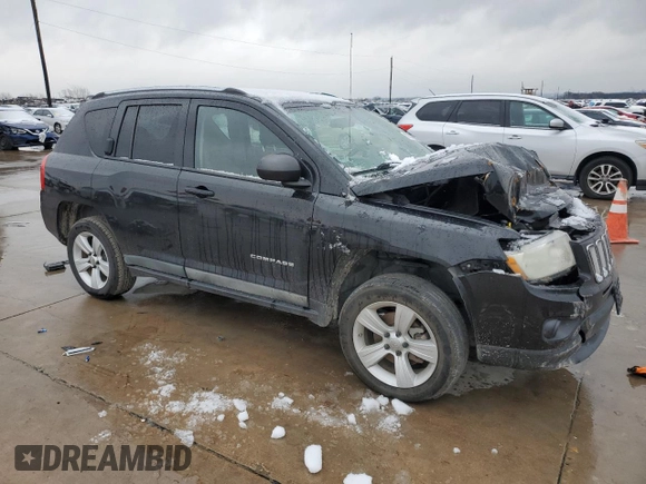 2011 Jeep Compass with VIN 1J4NT1FAXBD138041, listed as a Copart auction lot 87870855 with 184,549 mi miles and Clean Title. Bid and sale history available at carsss.com. Image 4.