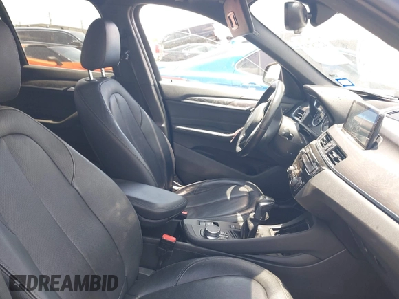 2017 BMW X1 xDrive28i with VIN WBXHT3Z30H4A65417, listed as a IAAI auction lot 42328797 with 103,788 mi miles and . Bid and sale history available at DreamBid. Image 5.