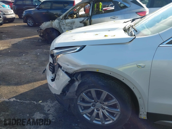 2022 Cadillac XT4 AWD Premium Luxury with VIN 1GYFZDR49NF105003, listed as a IAAI auction lot 41009382 with 43,395 mi miles and . Bid and sale history available at carsss.com. Image 6.