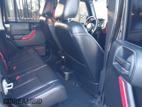 2017 Jeep Wrangler Unlimited Rubicon Recon z VIN 1C4BJWFG4HL723096, wystawiony jako IAAI lot #41393584 z przebiegiem 102 045 mil mil oraz . Historia ofert i sprzedaży dostępna na DreamBid. Obrazek 8.