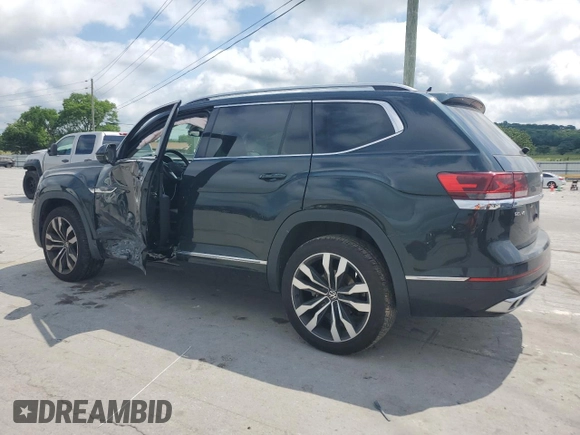 2021 Volkswagen Atlas SEL Premium R-Line with VIN 1V2FR2CA1MC500123, listed as a Copart auction lot 56912575 with 57,054 mi miles and Salvage title. Bid and sale history available at DreamBid. Image 2.
