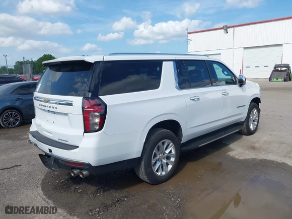 2023 Chevrolet Suburban Premier with VIN 1GNSCFKD3PR546579, listed as a IAAI auction lot 41969947 with 26,301 mi miles. Bid and sale history available at carsss.com. Image 4.