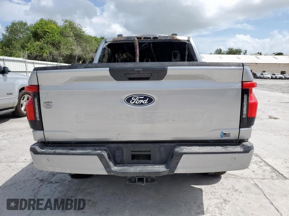 2024 Ford F-150 Lightning XLT with VIN 1FTVW3LK2RWG25755, listed as a Copart auction lot 59695355 with Not provided miles and Salvage title. Bid and sale history available at DreamBid. Image 6.
