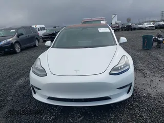 2018 Tesla Model 3 Long Range Battery with VIN 5YJ3E1EA3JF013253, listed as a IAAI auction lot 41752102 with 84,459 mi miles. Bid and sale history available at carsss.com. Image 12.