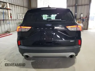 2020 Ford Escape S with VIN 1FMCU9F61LUB70605, listed as a Copart auction lot 58466065 with 70,348 mi miles and Salvage title. Bid and sale history available at DreamBid. Image 6.