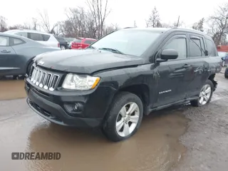 2012 Jeep Compass Sport with VIN 1C4NJDBB9CD658843, listed as a IAAI auction lot 41936099 with 216,780 mi miles and . Bid and sale history available at DreamBid. Image 2.