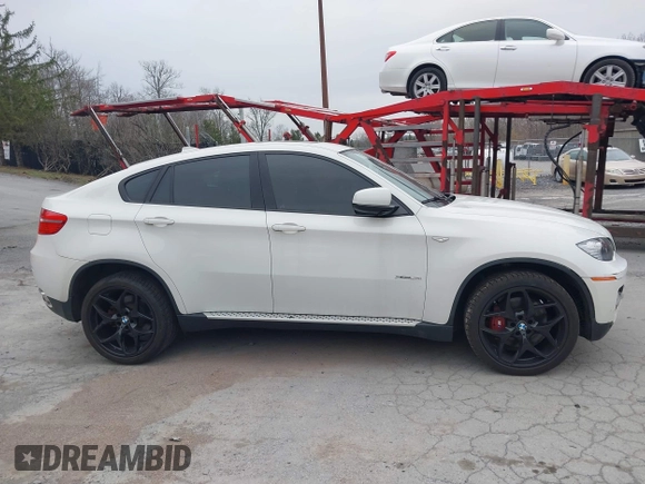 2012 BMW X6 50i z VIN 5UXFG8C53CL590479, wystawiony jako IAAI lot #42021810 z przebiegiem 92 420 mil mil oraz . Historia ofert i sprzedaży dostępna na DreamBid. Obrazek 13.