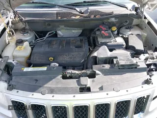 2011 Jeep Compass with VIN 1J4NT1FB4BD252724, listed as a IAAI auction lot 41247389 with 162,028 mi miles. Bid and sale history available at carsss.com. Image 10.