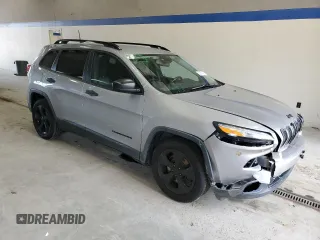 2017 Jeep Cherokee Altitude with VIN 1C4PJLABXHW586048, listed as a Copart auction lot 62674745 with 106,334 mi miles and Salvage title. Bid and sale history available at DreamBid. Image 4.