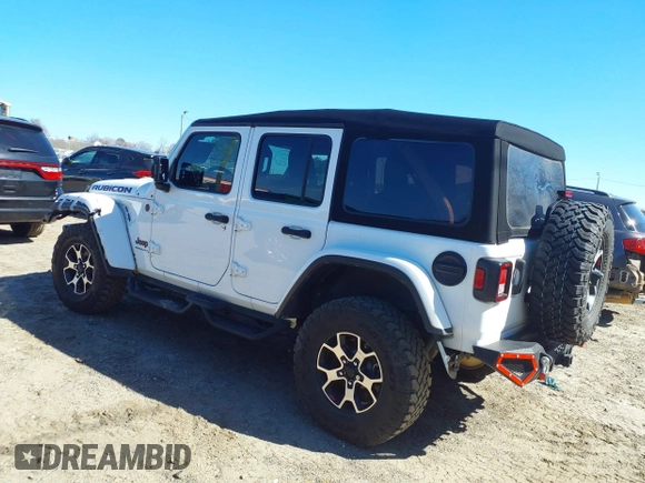 2023 Jeep Wrangler Rubicon with VIN 1C4HJXFG8PW655138, listed as a IAAI auction lot 41674959 with 40,790 mi miles and . Bid and sale history available at DreamBid. Image 3.