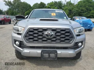 2020 Toyota Tacoma SR5 z VIN 3TMCZ5AN7LM302123, wystawiony jako Copart lot #57299805 z przebiegiem 43 244 mil mil oraz Szkoda całkowita • Salvage title. Historia ofert i sprzedaży dostępna na DreamBid. Obrazek 5.