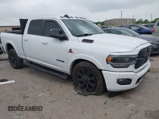 2022 Ram 2500 Laramie z VIN 3C6UR5FL4NG281929, wystawiony jako IAAI lot #41944614 z przebiegiem 206 501 mil mil oraz . Historia ofert i sprzedaży dostępna na DreamBid. Obrazek 1.