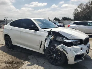 2018 BMW X6 xDrive35i z VIN 5UXKU2C54J0Z62026, wystawiony jako Copart lot #54604165 z przebiegiem 78 581 mil mil oraz Szkoda całkowita • Salvage title. Historia ofert i sprzedaży dostępna na DreamBid. Obrazek 4.