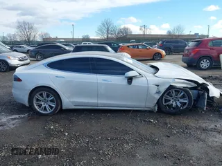 2021 Tesla Model S Long Range Plus with VIN 5YJSA1E20MF426400, listed as a IAAI auction lot 41453704 with Not provided miles and . Bid and sale history available at DreamBid. Image 12.