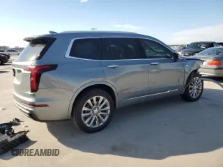 2023 Cadillac XT6 FWD Premium Luxury with VIN 1GYKPCRS4PZ124119, listed as a Copart auction lot 87836515 with 14,752 mi miles and Salvage title. Bid and sale history available at DreamBid. Image 3.