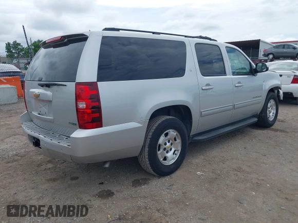 2011 Chevrolet Suburban LT with VIN 1GNSCJE05BR294452, listed as a IAAI auction lot 42107580 with 165,313 mi miles and . Bid and sale history available at DreamBid. Image 4.