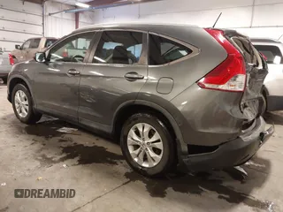 2014 Honda CR-V EX-L with VIN 5J6RM4H76EL043214, listed as a IAAI auction lot 41579664 with 124,681 mi miles. Bid and sale history available at carsss.com. Image 3.