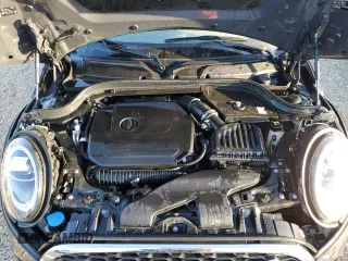 2021 MINI Hardtop 4 Door Cooper S z VIN WMWXU9C01M2P15282, wystawiony jako Copart lot #74238294 z przebiegiem Nie podano mil oraz Nie do naprawy • Non repairable. Historia ofert i sprzedaży dostępna na DreamBid. Obrazek 11.