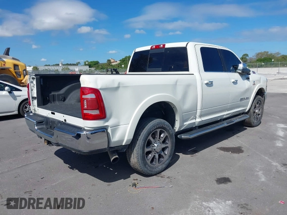 2020 Ram 2500 Longhorn with VIN 3C6UR5GL6LG230556, listed as a IAAI auction lot 38787704 with Not provided miles and . Bid and sale history available at DreamBid. Image 4.