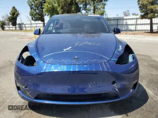 2021 Tesla Model Y Performance z VIN 5YJYGDEF0MF157795, wystawiony jako Copart lot #57163245 z przebiegiem 62 598 mil mil oraz Szkoda całkowita • Salvage title. Historia ofert i sprzedaży dostępna na DreamBid. Obrazek 5.