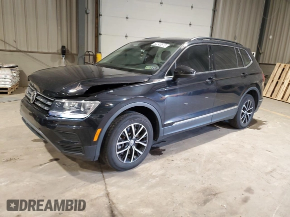 2021 Volkswagen Tiguan SE with VIN 3VV2B7AXXMM071024, listed as a Copart auction lot 52243675 with 31,448 mi miles and Salvage Title. Bid and sale history available at DreamBid. Image 1.