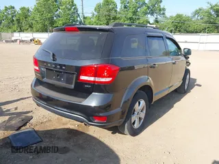 2012 Dodge Journey SXT z VIN 3C4PDCBG0CT290763, wystawiony jako IAAI lot #42553350 z przebiegiem 152 943 mil mil oraz . Historia ofert i sprzedaży dostępna na DreamBid. Obrazek 4.