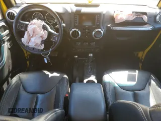 2015 Jeep Wrangler Unlimited Sahara with VIN 1C4HJWEG7FL593355, listed as a Copart auction lot 56784425 with 74,498 mi miles and Salvage title. Bid and sale history available at DreamBid. Image 8.