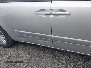 2011 Kia Sedona LX with VIN KNDMG4C7XB6363483, listed as a IAAI auction lot 41884439 with 243,076 mi miles. Bid and sale history available at carsss.com. Image 6.