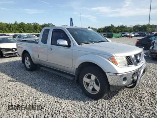 2007 Nissan Frontier SE with VIN 1N6AD06U87C438662, listed as a Copart auction lot 64315545 with 197,128 mi miles and Salvage title. Bid and sale history available at DreamBid. Image 4.