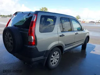 2006 Honda CR-V EX with VIN JHLRD688X6C016760, listed as a IAAI auction lot 41826866 with 294,185 mi miles. Bid and sale history available at carsss.com. Image 4.