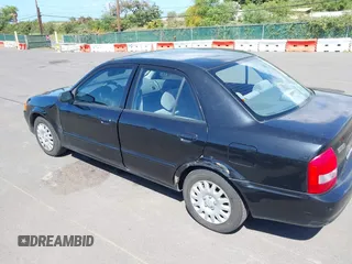 1999 Mazda Protege DX z VIN JM1BJ2228X0108327, wystawiony jako IAAI lot #41630708 z przebiegiem 171 459 mil mil oraz . Historia ofert i sprzedaży dostępna na DreamBid. Obrazek 6.