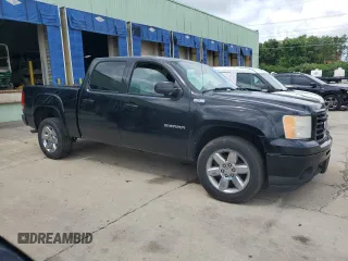 2013 GMC Sierra 1500 SLT with VIN 3GTP2WE72DG197661, listed as a Copart auction lot 60703615 with 132,503 mi miles and Salvage title. Bid and sale history available at DreamBid. Image 4.