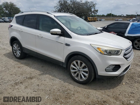 2017 Ford Escape Titanium with VIN 1FMCU0J93HUE01850, listed as a Copart auction lot 56075855 with 116,280 mi miles and Clean Title. Bid and sale history available at DreamBid. Image 4.