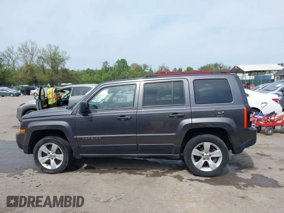 2014 Jeep Patriot Latitude with VIN 1C4NJRFB3ED847997, listed as a IAAI auction lot 42109140 with 121,299 mi miles and . Bid and sale history available at carsss.com. Image 14.